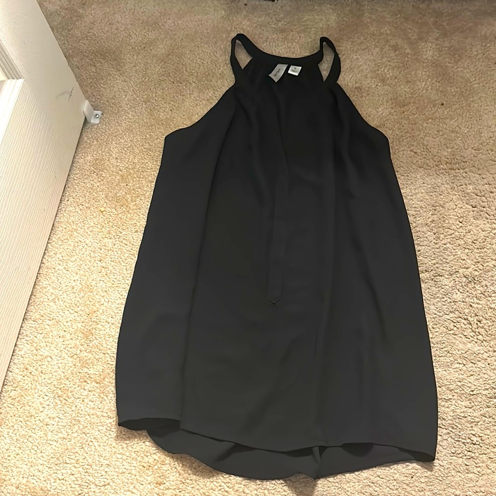 Black going out top